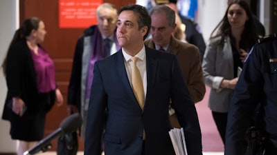 In this Feb. 28, 2019, file photo, Michael Cohen, President Donald Trump's former lawyer, leaves a closed-door interview before the House Intelligence Committee on Capitol Hill in Washington. Hundreds of pages of court records made public Tuesday, March 19, revealed that special counsel Robert Mueller quickly zeroed in on Cohen in the early stages of his Russia probe. ()