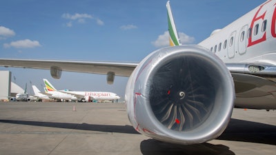 An Ethiopian Airlines Boeing 737 Max 8 as it sits grounded at Bole International Airport in Addis Ababa, Ethiopia, Saturday, March 23, 2019.