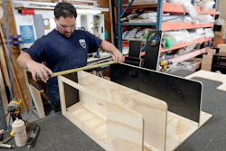 In this July 11, 2018, file photo, a worker assembles interior cabinets for a boat at Regal Marine Industries in Orlando, Fla.