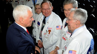 Vice President Mike Pence speaks with museum docents at the National Space Council meeting, held at the U.S. Space and Rocket Center Tuesday, March 26, 2019, in Huntsville, Ala.