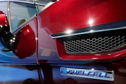 The fuel cell logo adorns the fender of a Honda Clarity at a media preview at the New York International Auto Show on Wednesday, April 12, 2017.