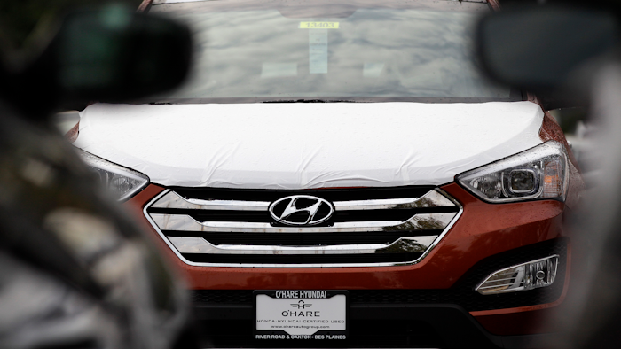 This Oct. 4, 2012, file photo shows a Hyundai Sonata at a Hyundai car dealership in Des Plaines, Ill.