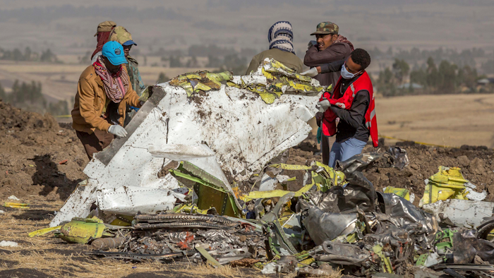 In this March 11, 2019, file photo, rescuers work at the scene of an Ethiopian Airlines flight crash near Bishoftu, Ethiopia.