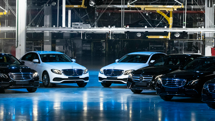 Cars displayed during an opening ceremony of the Mercedes Benz automobile assembly plant outside Moscow, Wednesday, April 3, 2019.