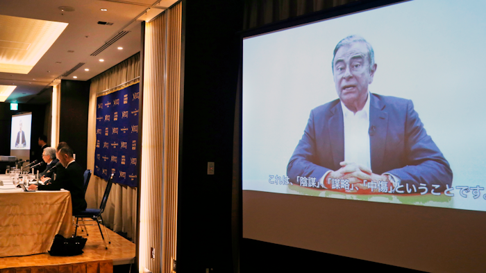 Former Nissan chairman Carlos Ghosn speaks in a video during a press conference held by his lawyers in Tokyo, Tuesday, April 9, 2019.