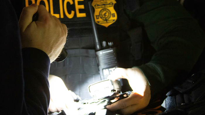 HHS Office of Inspector General agents take part in arrests Tuesday, April 9, 2019, in Queens, N.Y.