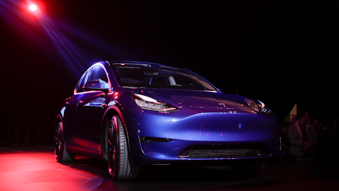 In this March 14, 2019, file photo, the Tesla Model Y is unveiled at Tesla's design studio in Hawthorne, Calif.