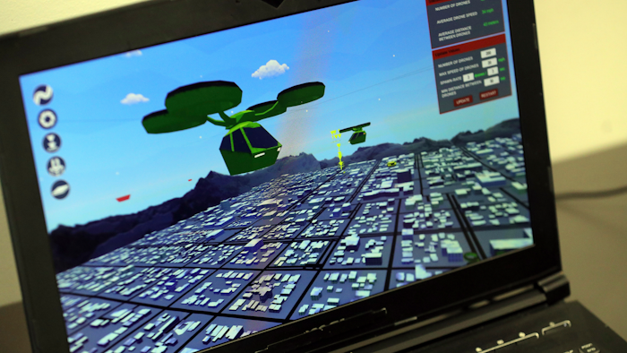 A computer screen shows 'Drone Commander' during the 'EAE Launch' event at the University of Utah, Wednesday, April 24, 2019.