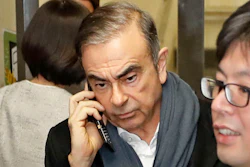 In this March 12, 2019, photo, former Nissan Chairman Carlos Ghosn leaves his lawyer's office in Tokyo.