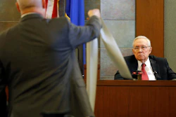 Former U.S. Sen. Harry Reid sits in the witness stand, Thursday, March 28, 2019, in Las Vegas.