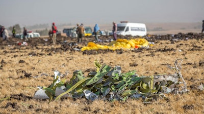 In this March 11, 2019, file photo, parts of plane wreckage are shown outside Addis Ababa, Ethiopia.