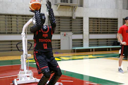 Toyota’s basketball robot Cue 3 demonstrates Monday, April 1, 2019, at a gymnasium in Fuchu, Tokyo.
