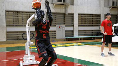 Toyota’s basketball robot Cue 3 demonstrates Monday, April 1, 2019, at a gymnasium in Fuchu, Tokyo.