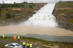 Water flows down the Oroville Dam spillway in Oroville, Calif., Tuesday, April 2, 2019.