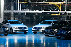 Cars displayed during an opening ceremony of the Mercedes Benz automobile assembly plant outside Moscow, Wednesday, April 3, 2019.