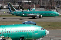 In this March 22, 2019, file photo, a Boeing 737 Max 8 taxis before takeoff from Renton Municipal Airport in Renton, Wash.