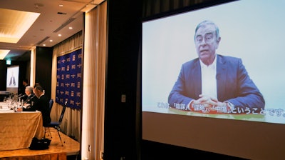 Former Nissan chairman Carlos Ghosn speaks in a video during a press conference held by his lawyers in Tokyo, Tuesday, April 9, 2019.
