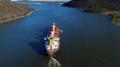 In this April 26, 2018, file photo, the Orient Dispatch, a bulk carrier ship, makes its way south on the Hudson River near Peekskill, N.Y.