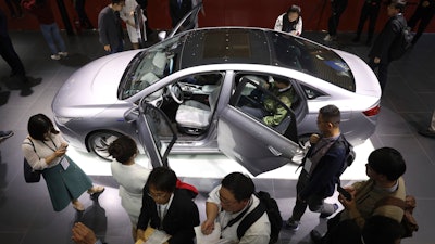 Geely Auto displays a sedan from its new electric brand Geometry during the Auto Shanghai 2019 show, Tuesday, April 16, 2019.