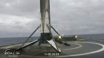 This Thursday, April 11, 2019, image from video shows a Falcon rocket booster shortly after landing on a barge in the Atlantic Ocean off Florida.