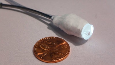 This undated photo shows the tip of a robotic catheter equipped with a small camera and lighting encased in silicone,.