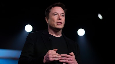 In this Thursday, March 14, 2019, file photo, Tesla CEO Elon Musk speaks before unveiling the Model Y at the company's design studio in Hawthorne, Calif.