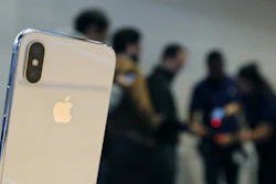 The Apple iPhone X sits on display at the Apple Michigan Avenue store in Chicago on Friday, Nov. 3, 2017.