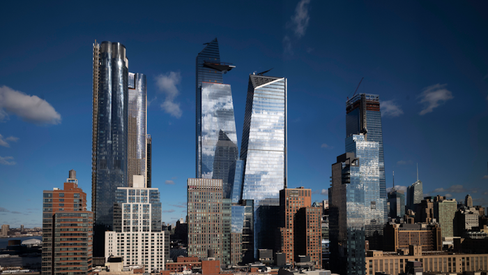 In this Dec. 4, 2018 photo, skyscrapers rise above Hudson Yards on the west side of Manhattan.
