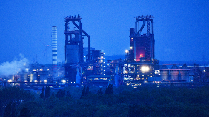 The furnace of German steelmaker Thyssenkrupp is illuminated in the evening twilight in Duisburg, Germany, Thursday, May 9, 2019.