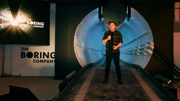 In this Dec. 18, 2018, file photo Elon Musk speaks during an unveiling event for the Boring Co. test tunnel in Hawthorne, Calif.