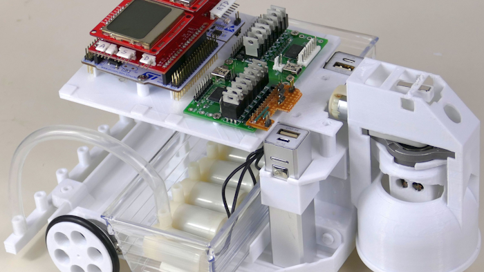 GraffitiBot is a fully autonomous ground vehicle capable of printing graphics on the surface it is traversing.