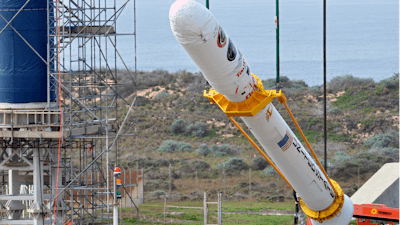 Orbital Sciences workers monitor NASA's Glory upper stack as a crane lifts it from a stationary rail for attachment to the Taurus XL rocket's Stage 0, Space Launch Complex 576-E, Vandenberg Air Force Base, Calif.