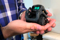 In this July 30, 2018, file photo, Anki Inc. CEO Boris Sofman holds Vector, the company's home robot, in New York.