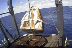 In this March 8, 2019, file image, the SpaceX Crew Dragon capsule is hoisted onto a ship off the Florida coast after it returned from a mission to the International Space Station.