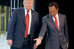 In this Thursday, June 28, 2018, file photo, President Donald Trump takes a tour of Foxconn with Foxconn chairman Terry Gou in Mt. Pleasant, Wis.