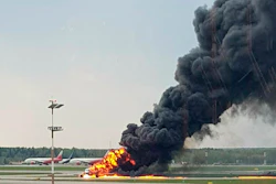 This image, provided by Riccardo Dalla Francesca, shows smoke rising from a fire on a plane at Moscow's Sheremetyevo airport on Sunday, May 5, 2019.