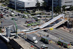 In this March 15, 2018, file photo, emergency personnel respond after a brand-new pedestrian bridge collapsed onto a highway at Florida International University in Miami.