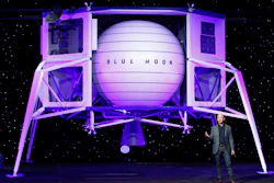 Jeff Bezos speaks in front of a model of Blue Origin's Blue Moon lunar lander, Thursday, May 9, 2019, in Washington.