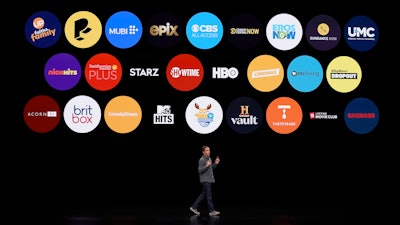 In this March 25, 2019, file photo, Peter Stern, Apple Vice President of Services, speaks during an event to announce new products in Cupertino, Calif.