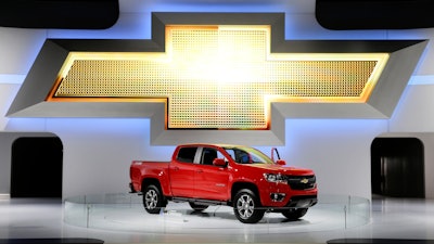 In this Nov. 21, 2013, file photo, the new 2015 Chevrolet Colorado pickup truck is on display at the Los Angeles Auto Show.