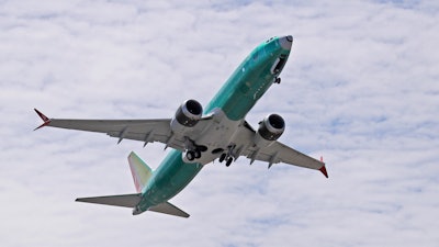 In this May 8, 2019, file photo, a Boeing 737 MAX 8 jetliner takes off on a test flight in Renton, Wash.