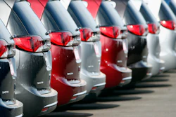 In this April 15, 2018, file photo, unsold 2018 Pacifica minivans sit on a Chrysler dealer's lot in the south Denver suburb of Englewood, Colo.