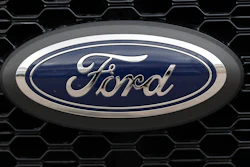 This Feb. 17, 2019, file photo shows the grille of an unsold 2019 F150 pickup truck at a dealership in Broomfield, Colo.