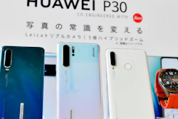 In this May 21, 2019, photo, Huwaei's new products are on display during a news conference in Tokyo.