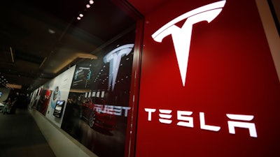 This Feb. 9, 2019, file photo shows a Tesla store in Cherry Creek Mall, Denver.