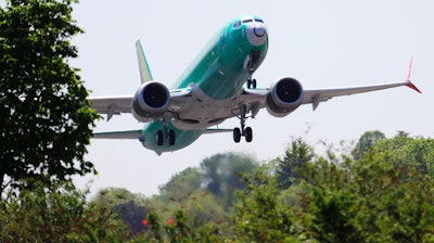 In this May 8, 2019, file photo, a Boeing 737 MAX 8 jetliner takes off on a test flight in Renton, Wash.