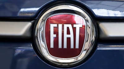In this Feb. 14, 2019, file photo, the Fiat logo mounted on a 2019 500 L at the Pittsburgh International Auto Show.