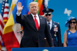 President Donald Trump waves as he takes the stage to speak at the U.S. Air Force Academy graduation, Thursday, May 30, 2019.