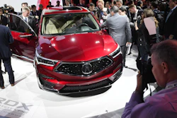 Members of the media photograph the Acura RDX Prototype at the North American International Auto Show, Monday, Jan. 15, 2018, in Detroit.