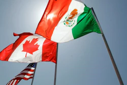 In this April 21, 2008, file photo, national flags of the United States, Canada, and Mexico fly in New Orleans.